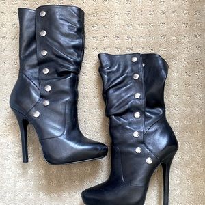 Aldo black heeled boots. Worn twice in great condition.